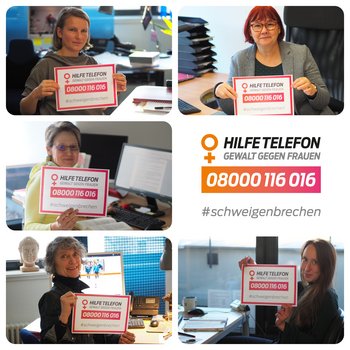 5 employees of the women's shelter coordination office each hold a sign "Helpline for violence against women: 08000116016 #BreakTheSilence"