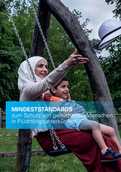 A woman wearing a headscarf swings a child on her lap. The caption reads: Minimum standards for the protection of refugees in refugee accommodation.